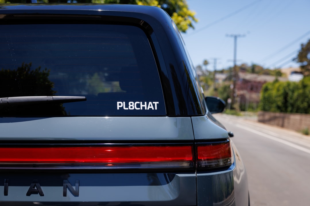 PL8CHAT connected vehicle with license plate sticker